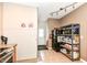 This kitchen shows a refrigerator and microwave with convenient shelving at 7145 Lafayette Rd, Indianapolis, IN 46278