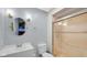 Bathroom featuring a walk-in shower, modern vanity and faucet, and contemporary lighting fixtures at 715 Pioneer Dr, Indianapolis, IN 46217
