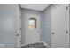 The foyer features gray walls, geometric flooring, and a door with decorative diamond windows at 715 Pioneer Dr, Indianapolis, IN 46217