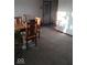 Inviting dining room featuring a wooden table set and neutral carpeting at 721 1St Ne Ave, Carmel, IN 46032