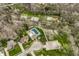 Aerial view of a neighborhood with a community pool and tennis courts, showcasing amenities for an active lifestyle at 7326 Elm Ridge Dr, Indianapolis, IN 46236
