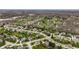 Sprawling residential area showcases lush greenery, mature trees, and diverse architectural styles at 7326 Elm Ridge Dr, Indianapolis, IN 46236