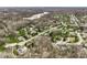 Aerial view of a residential neighborhood with mature trees, showcasing a peaceful and established community at 7326 Elm Ridge Dr, Indianapolis, IN 46236