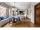 Open floor plan with an eat-in kitchen and dining area with hardwood floors at 7326 Elm Ridge Dr, Indianapolis, IN 46236