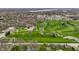 Aerial view of a golf course, highlighting lush greenery and manicured fairways, perfect for golf enthusiasts at 7326 Elm Ridge Dr, Indianapolis, IN 46236