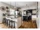 Bright kitchen with a large island, granite countertops, and stainless steel appliances at 7326 Elm Ridge Dr, Indianapolis, IN 46236