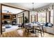 Open concept living and dining area features hardwood floors and a fireplace at 7326 Elm Ridge Dr, Indianapolis, IN 46236