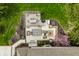 Aerial view of a patio with a covered pergola and furniture creating an inviting space for outdoor relaxation and entertainment at 7326 Elm Ridge Dr, Indianapolis, IN 46236