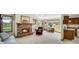Inviting living space with a brick fireplace and views of the landscaped backyard at 803 S School St, Brownsburg, IN 46112