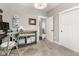 Spacious home office featuring carpet floors, gray walls, and a white door and trim at 978 S Fairway Village Ct, Greenfield, IN 46140