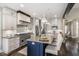 A modern kitchen featuring a central island, stainless steel appliances, and granite countertops at 978 S Fairway Village Ct, Greenfield, IN 46140