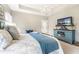 Spacious main bedroom with a chandelier, sitting area, and plenty of natural light at 978 S Fairway Village Ct, Greenfield, IN 46140