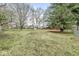 Expansive backyard with mature trees, offering ample space for recreation and outdoor enjoyment at 1132 Sheffield Dr, Avon, IN 46123