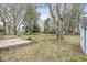 A large backyard with mature trees and a storage shed, perfect for outdoor activities and relaxation at 1132 Sheffield Dr, Avon, IN 46123