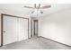 Bedroom with carpet, closet, and access to other rooms at 1132 Sheffield Dr, Avon, IN 46123