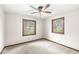 Bedroom featuring two windows providing ample natural light and outdoor views at 1132 Sheffield Dr, Avon, IN 46123