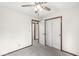Bedroom with neutral carpet, closet space, and access to other rooms at 1132 Sheffield Dr, Avon, IN 46123