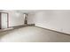 Open living room featuring wood floors and access to multiple rooms at 1132 Sheffield Dr, Avon, IN 46123