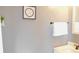 A well-lit bathroom featuring decorative wall art, a towel rack, and a sleek vanity with a mirror at 1139 Topp Creek Dr, Indianapolis, IN 46214