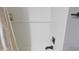 Bright bathroom featuring white subway tile, and a modern black faucet at 1139 Topp Creek Dr, Indianapolis, IN 46214