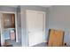 Bedroom featuring a closet with sliding doors and a glimpse into a walk-in closet space at 1139 Topp Creek Dr, Indianapolis, IN 46214