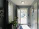 Welcoming foyer with neutral walls, bright lighting, and decorative plants, creating a warm ambiance at 1139 Topp Creek Dr, Indianapolis, IN 46214