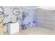 Spacious garage featuring an open door, with room for parking and storage of bikes and other items at 1139 Topp Creek Dr, Indianapolis, IN 46214