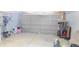Spacious garage with a large garage door, ample storage space, and potential for various uses at 1139 Topp Creek Dr, Indianapolis, IN 46214
