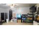 Spacious garage with tv and refrigerator, perfect for relaxing or working on projects at 1139 Topp Creek Dr, Indianapolis, IN 46214
