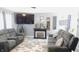 Spacious living room boasting modern furniture, a fireplace, and elegant decor, perfect for entertaining at 1139 Topp Creek Dr, Indianapolis, IN 46214