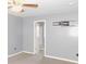 Bedroom with gray walls, walk-in closet, and wall mount for flat screen TV at 1139 Topp Creek Dr, Indianapolis, IN 46214