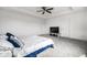 Comfortable main bedroom has plush carpet, a tray ceiling, lots of light, and two closets at 11629 Brookwood Trace Ln, Indianapolis, IN 46229