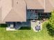 Aerial view of backyard with patio and outdoor seating area, including a hot tub at 13225 Gatman Ct, Carmel, IN 46032