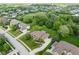 Aerial view of the home showcasing its well-manicured lawn and surrounding landscape at 13225 Gatman Ct, Carmel, IN 46032