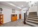 Finished basement staircase featuring carpeted steps at 13225 Gatman Ct, Carmel, IN 46032