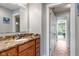 Stylish bathroom with granite counters, tile floor, and modern fixtures at 13225 Gatman Ct, Carmel, IN 46032