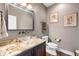 Contemporary bathroom featuring a modern glass sink, granite countertop, and a toilet at 13225 Gatman Ct, Carmel, IN 46032