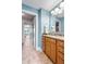 Updated bathroom featuring a granite countertop and a view to bedroom at 13225 Gatman Ct, Carmel, IN 46032