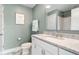 Bathroom with a large mirror and a white marble countertop at 13225 Gatman Ct, Carmel, IN 46032