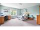 Cozy bedroom with a desk, natural light, and neutral decor at 13225 Gatman Ct, Carmel, IN 46032