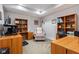 Functional home office with built-in shelving and desk space, perfect for remote work or study at 13225 Gatman Ct, Carmel, IN 46032