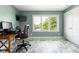 Bright office with a large window and a television on the wall at 13225 Gatman Ct, Carmel, IN 46032
