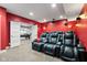 Comfortable home theater adjacent to the game room for ultimate entertainment and relaxation at 13225 Gatman Ct, Carmel, IN 46032