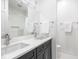 Bathroom with a double sink vanity, modern fixtures, and ample counter space at 1326 E 10Th St, Indianapolis, IN 46202