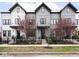 Charming townhomes boast modern architecture, black framed windows and beautiful landscaping at 1326 E 10Th St, Indianapolis, IN 46202