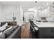Bright kitchen with a large island, pendant lighting, and hardwood floors at 1326 E 10Th St, Indianapolis, IN 46202