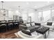 Open concept living space with kitchen view, offering modern design and hardwood floors at 1326 E 10Th St, Indianapolis, IN 46202
