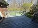 A spacious back deck with gray paint at 1348 Secretariat Ln, Indianapolis, IN 46217