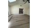 Open living area with access to the kitchen featuring stylish, modern flooring at 1348 Secretariat Ln, Indianapolis, IN 46217