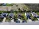 Overhead view of a home with mature trees, a well-maintained lawn, and a fenced backyard offering privacy at 13660 N Ayrshire Cir, Camby, IN 46113